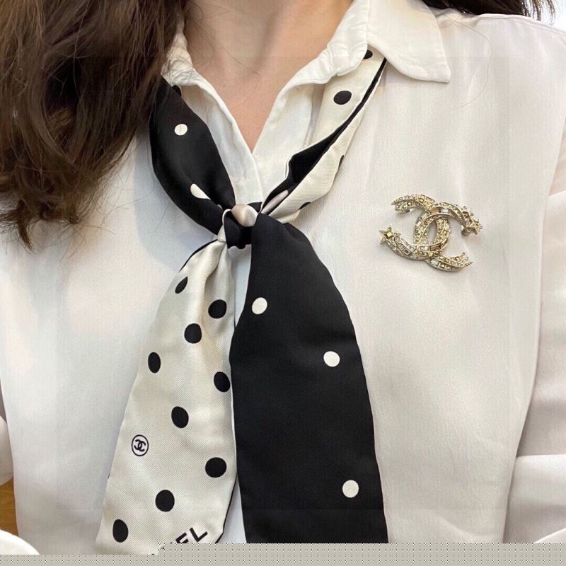 Ch*el brooches